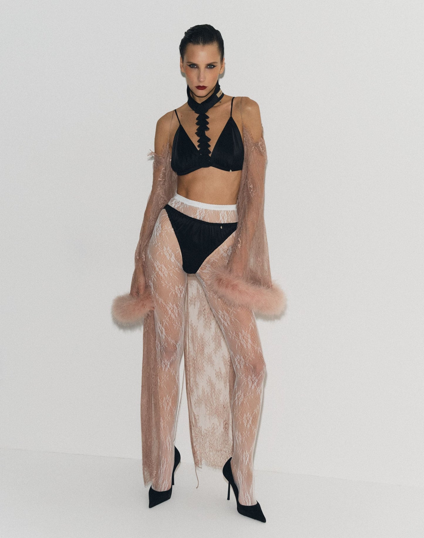 Lace cape with feathers